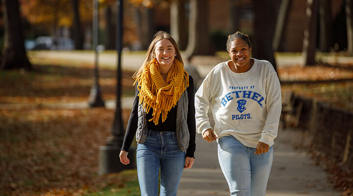 students walking on campus