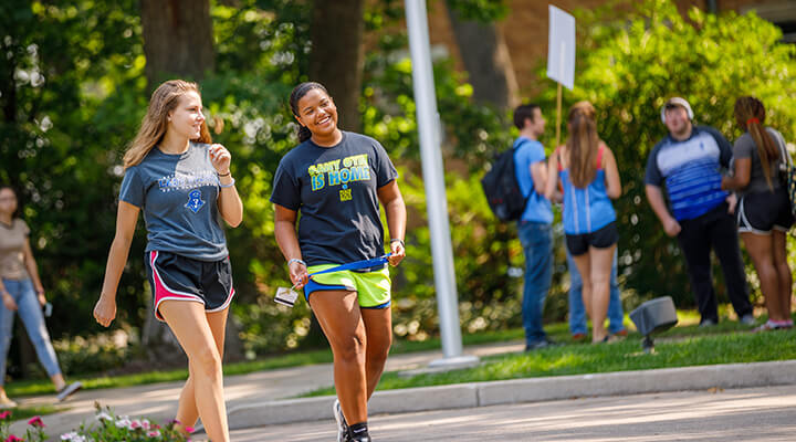 students walking on campus